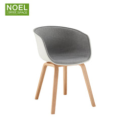 Nata, Half soft upholstery seat plastic PP seat wood leg modern famous nordic dining chair